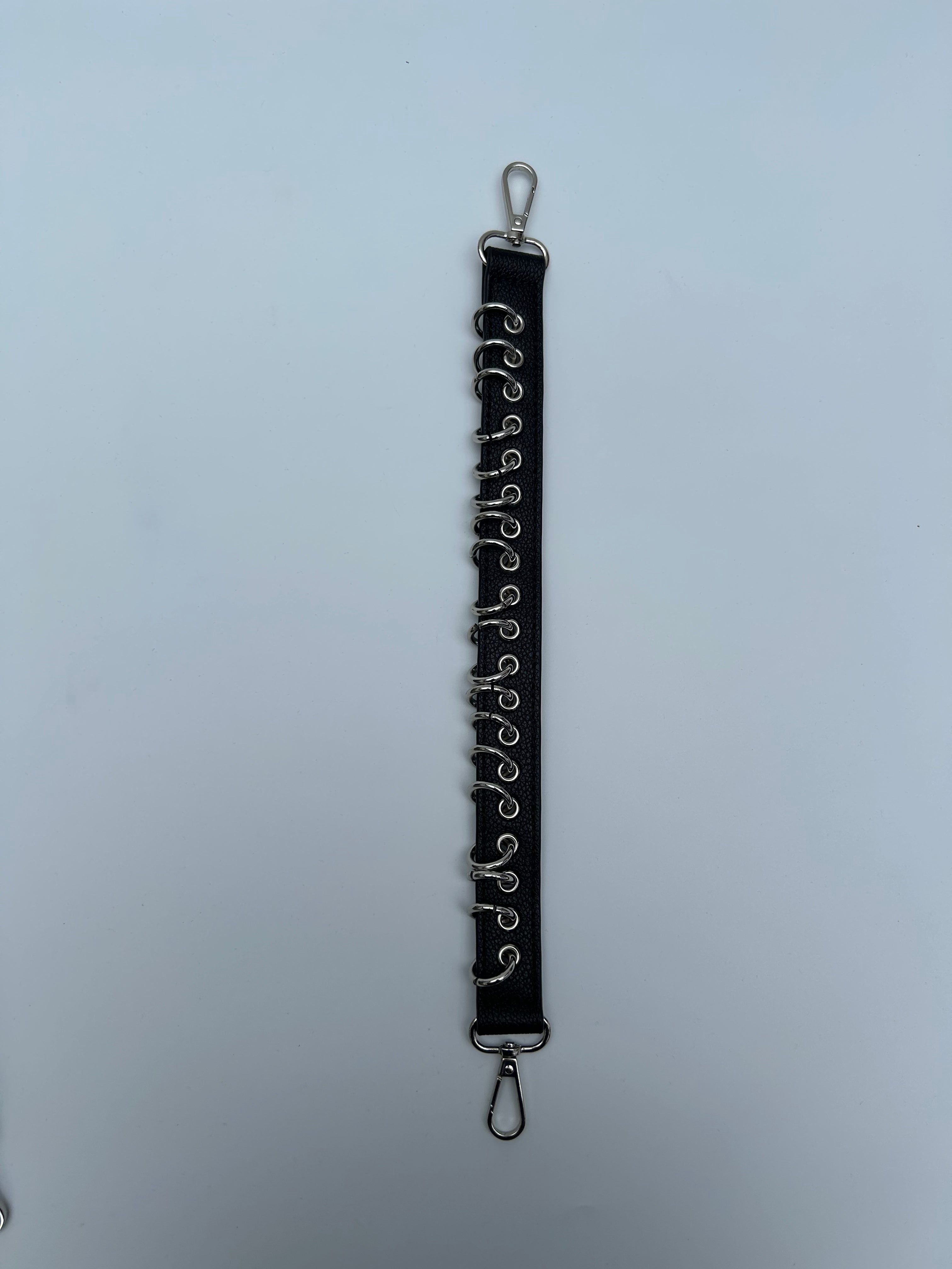 Black short bag strap
